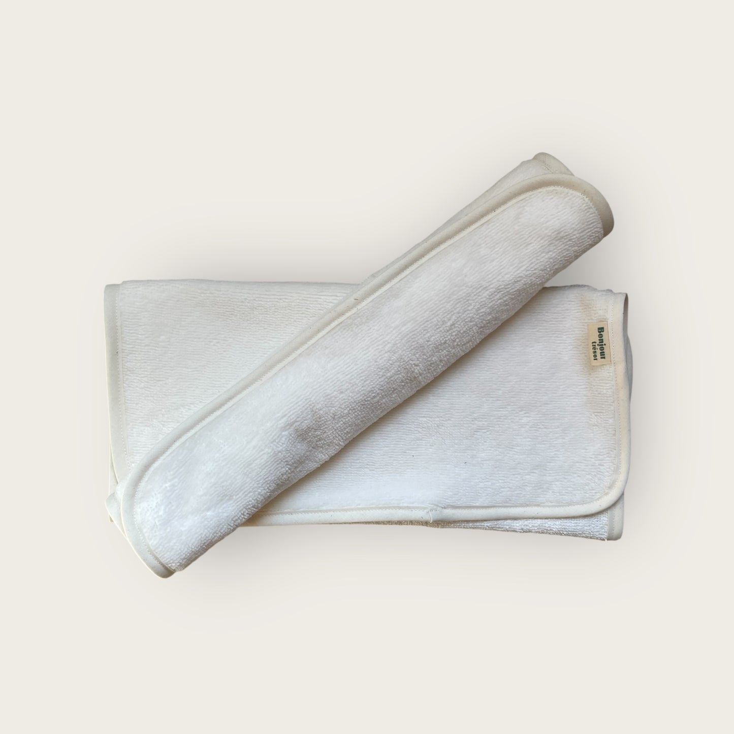 Serviette pour tapis à langer