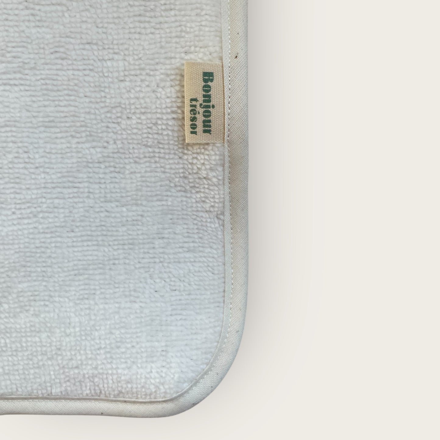 Serviette pour tapis à langer