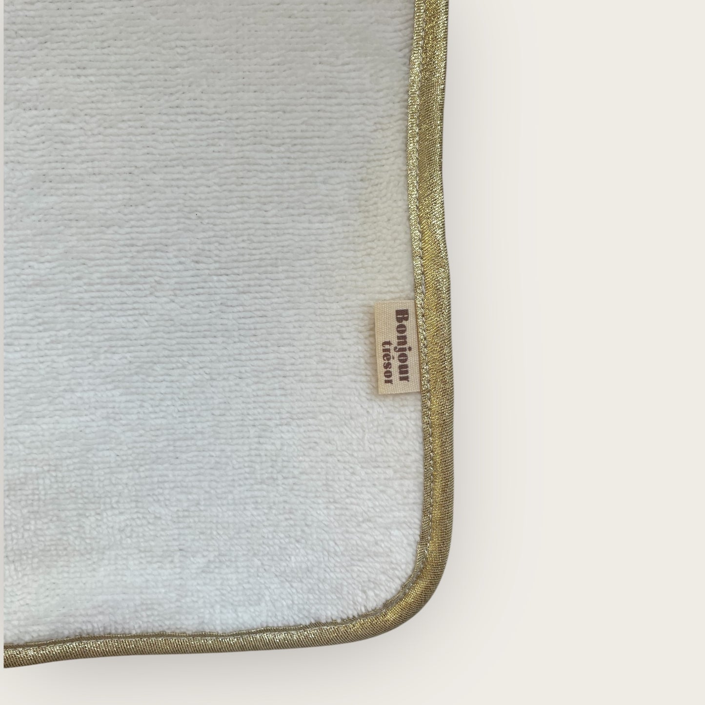Serviette pour tapis à langer