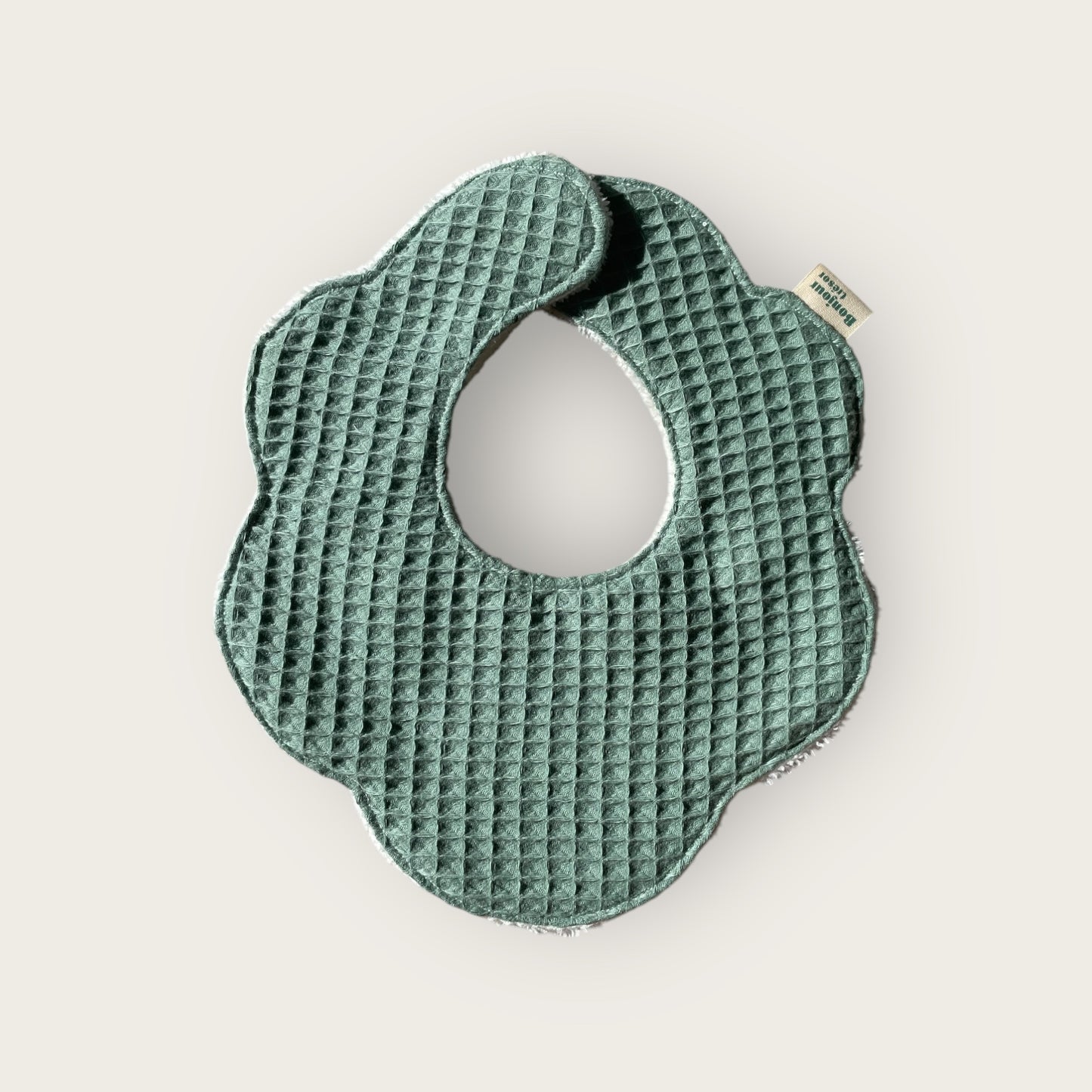 Bavoir fleur Taille M