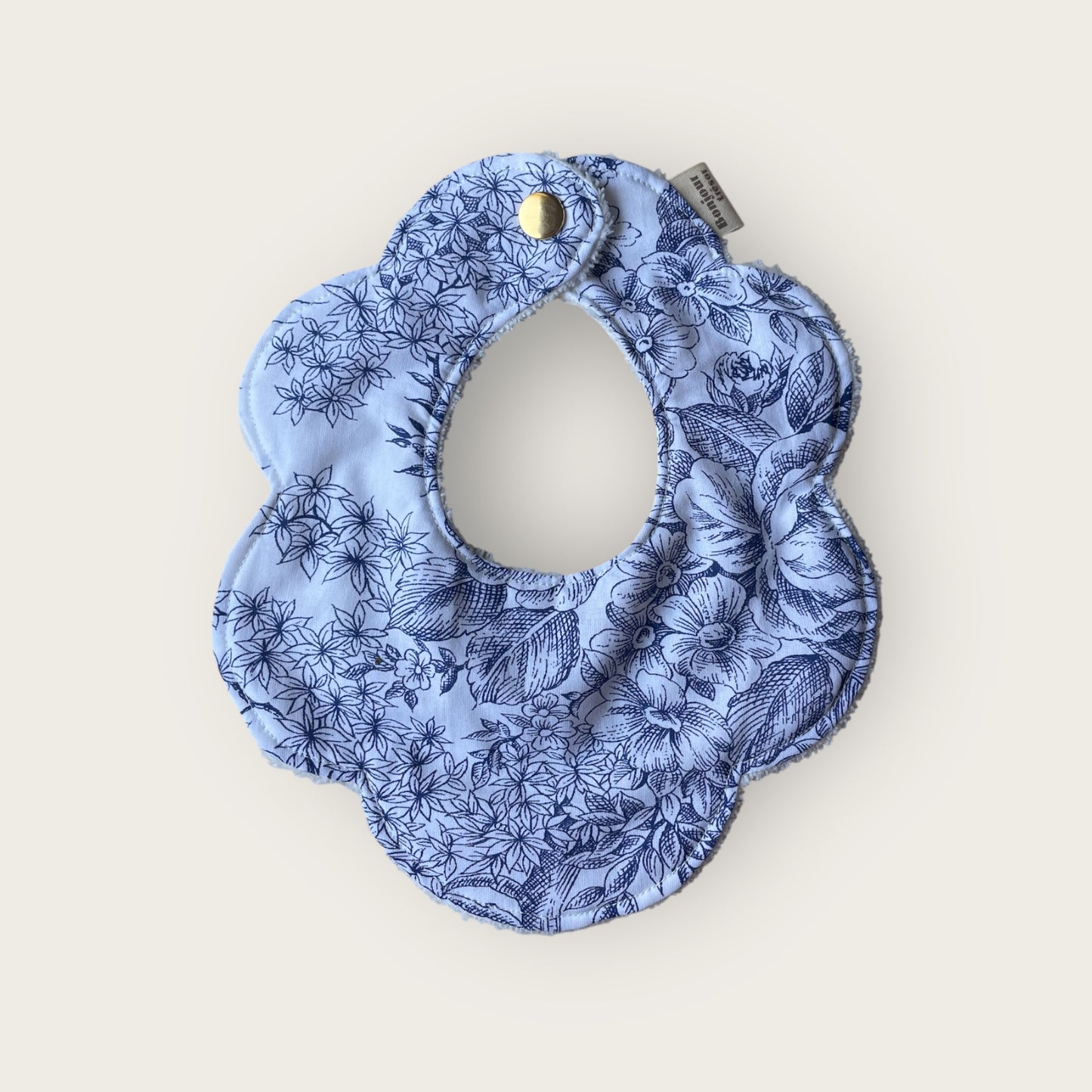 Bavoir fleur Taille M