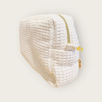 Trousse de toilette nid d’abeille
