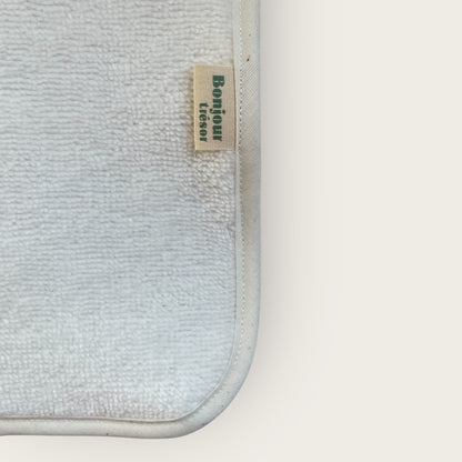 Serviette pour tapis à langer
